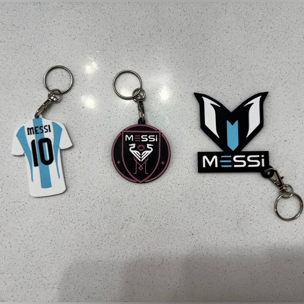 3 piece Messi Keychain Set - Blue, Pink, Black